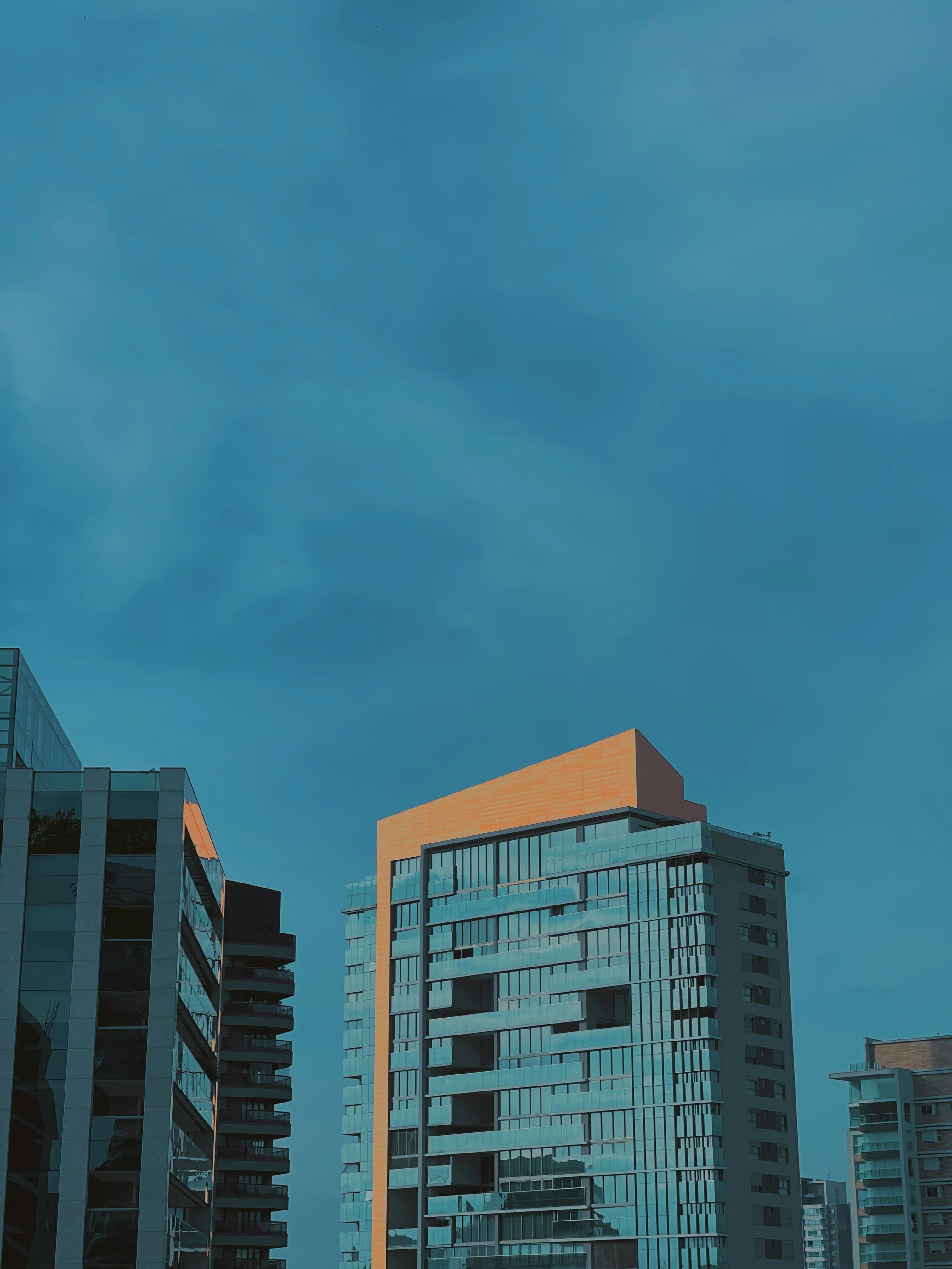 Urban skyline at dusk with blue tones